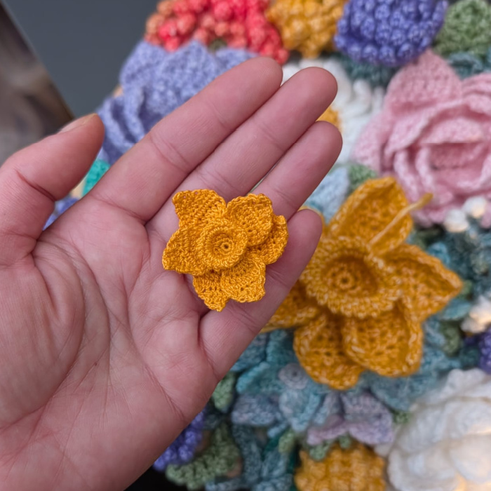 tiny micro crochet daffodil made with sewing thread and 1mm hook